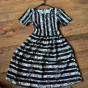 Slightly used black and white waisted dress, worn once some stretch